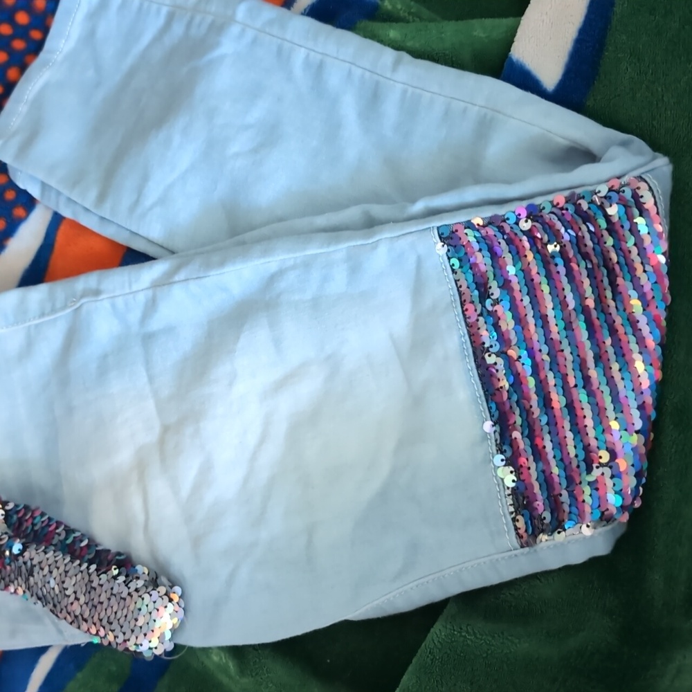Girls jeans with accessory.
